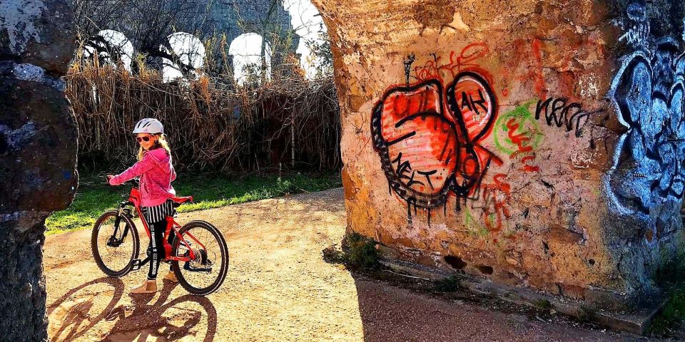 Rome: Appian Way & Catacomb Sunset E-bike Tour with Aperitif - Porta San Sebastiano and the transition into the countryside