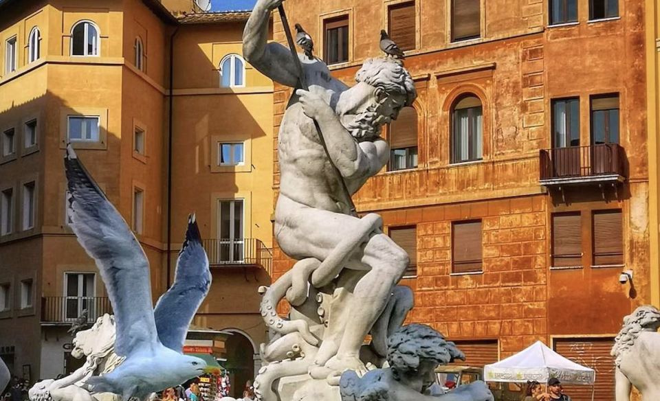 Rome at Twilight Tour Among the Piazzas and Fountains - Trevi Fountain after dark: triumphal arch theatrics and the water story