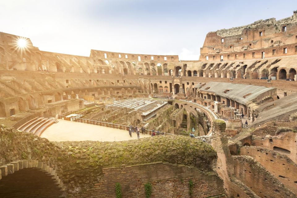 Rome: Colosseum Underground, Arena & Forum Tour - Colosseum Time With a Spanish Guide: Engineering Meets Power and Games