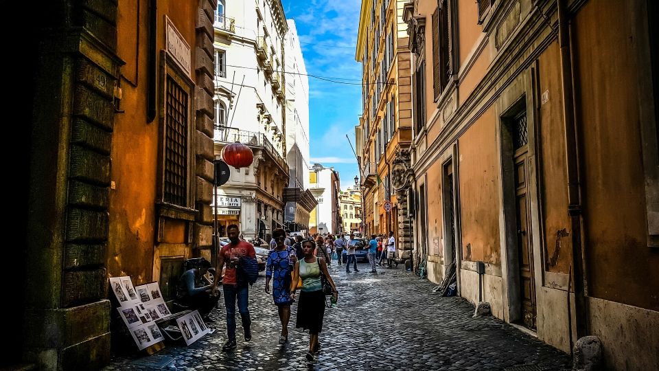 Rome: Food and Wine Tour, Trastevere and Jewish Ghetto - Across Toward the Tiber Island: From Roman Streets to the Ghetto
