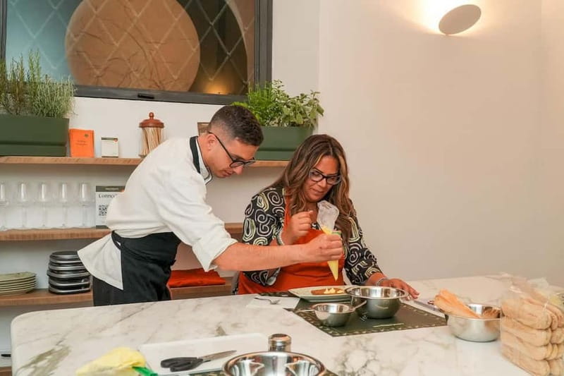 Rome: Hands-On Pasta & Tiramisu Class with Unlimited Wine - The table moment: wine, snacks, and a chef-guided rhythm