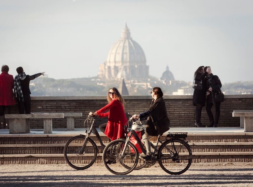 Rome: Private Half-Day Bike Tour with E-bike - Entering the Colosseum Area: Why You Start Big